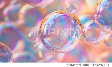 A cluster of iridescent bubbles floating in a softly lit space, showcasing a spectrum of pastel colors reflecting and refracting light. 123292181