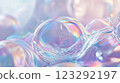 Iridescent Bubbles: Captivating reflections in liquid orbs, creating ethereal beauty and delicate textures. Light plays across smooth surfaces. 123292197