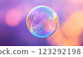 Delicate iridescent sphere floating in a pastel dream, a dance of light and color captured in a moment of ethereal beauty. 123292198