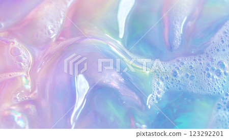 Iridescent swirls of liquid with soft foam details, creating a mesmerizing and abstract visual texture. The pastel hues blend seamlessly. 123292201
