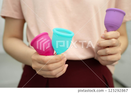 Asian woman holding menstrual cup for hygiene menstrual period cycle protection. Asian woman holding menstrual cup for hygiene menstrual period cycle protection. 123292867