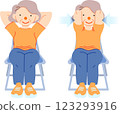 Senior woman sitting in a chair and doing gymnastics 123293916