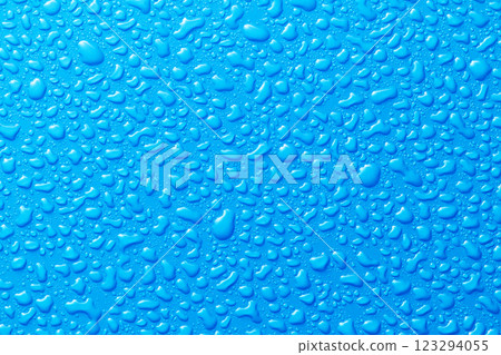 Image of water droplets Blue background 123294055