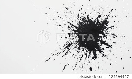 Bold black paint splatter creating a dramatic abstract effect 123294437