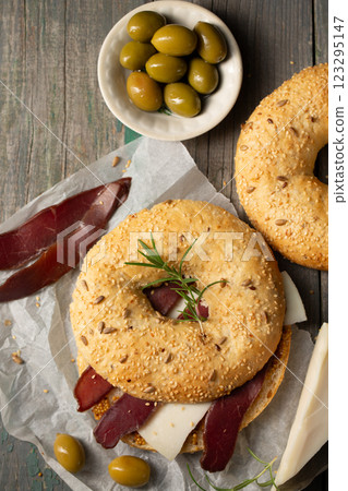 Burger with basturma and rosemary, top view Burger with basturma and rosemary, top view 123295147