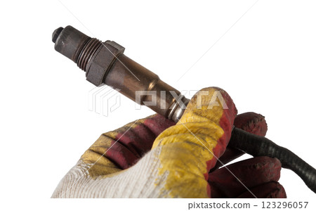 Lambda probe - oxygen sensor device designed to record amount of remaining oxygen in the exhaust gas of car engine is located in exhaust system. Metal spare part for replacement to repair in workshop. 123296057