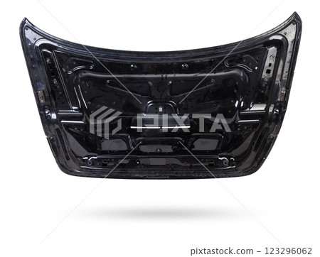Black metallic boot lid reverse side with stiffeners on a white isolated background in a photo studio with a nameplate for installation on a car after an accident. Spare part for body repair. Black metallic boot lid reverse side with stiffeners on a white isolated background in a photo studio with a nameplate for installation on a car after an accident. Spare part for body repair. 123296062