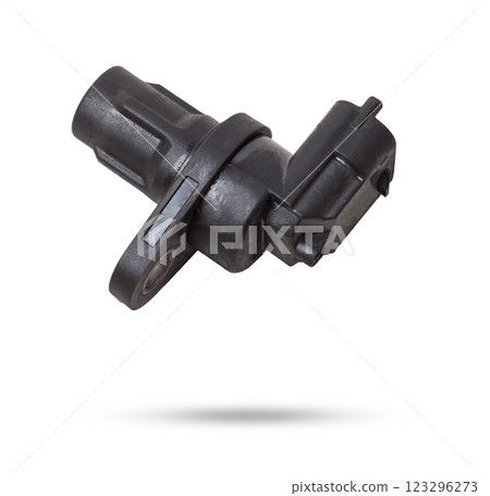 Electromagnetic crankshaft position sensor of a car engine in the hands of an auto mechanic. Spare parts catalog. 123296273