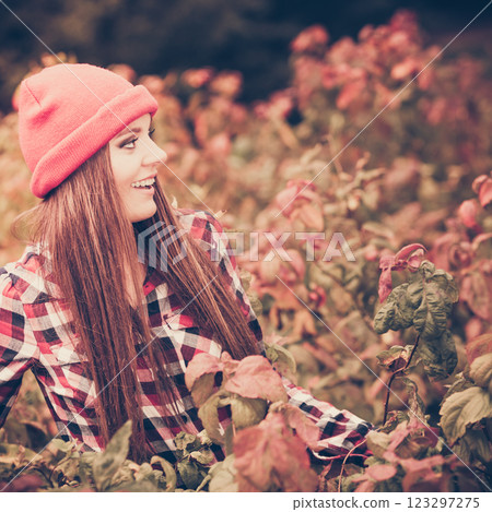 Portrait girl relaxing walking in autumnal park. Portrait girl relaxing walking in autumnal park. 123297275