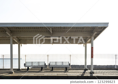 A view of the platform with an ocean view at Baishuji Station in Matsuyama, Ehime Prefecture, Shikoku 123299823