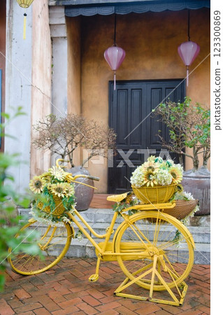 Stylish yellow bicycle Stylish yellow bicycle 123300869