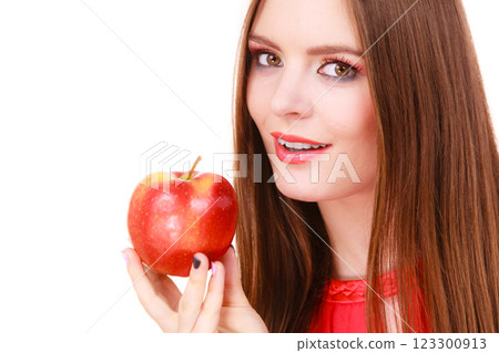 Woman charming girl colorful makeup holds apple fruit Woman charming girl colorful makeup holds apple fruit 123300913
