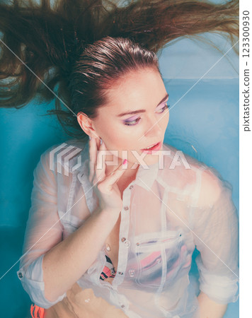 Portrait of sexy seductive woman in water. Portrait of sexy seductive woman in water. 123300930