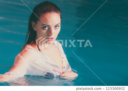 Portrait of mysterious seductive woman in water. Portrait of mysterious seductive woman in water. 123300932