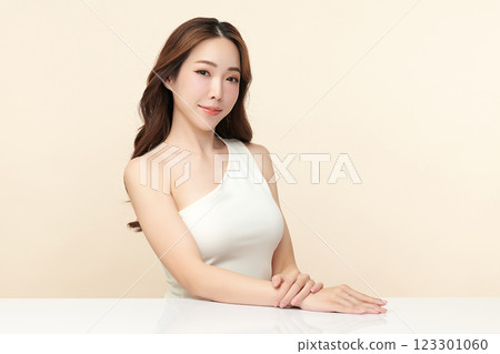 Beautiful young asian woman with clean fresh skin on beige background, Face care, Facial treatment, Cosmetology, beauty and spa, Asian women portrait. Beautiful young asian woman with clean fresh skin on beige background, Face care, Facial treatment, Cosmetology, beauty and spa, Asian women portrait. 123301060