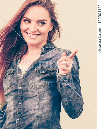 Young smiling lady gesturing. Young smiling lady gesturing. 123301165
