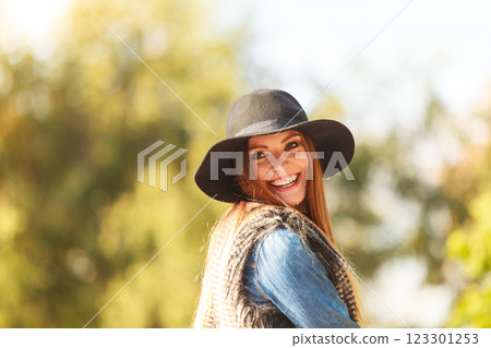 Cheerful woman having fun outdoors 123301253