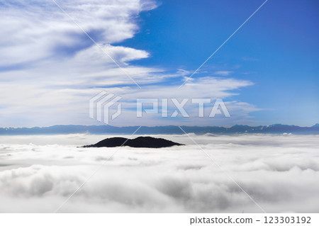 Mountains floating in a sea of clouds and a beautiful sky 123303192
