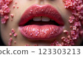 Close-up of beautiful aesthetic lips with red lipstick filled with decorative flowers around, sexy and sensual 123303213