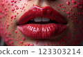 Close-up of beautiful aesthetic lips with red lipstick filled with decorative hearts around, sexy and sensual atmosphere 123303214