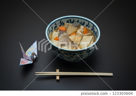 Enjoy warm Himokawa Udon noodles stewed with root vegetables during the cold winter. Enjoy warm Himokawa Udon noodles stewed with root vegetables during the cold winter. 123303604