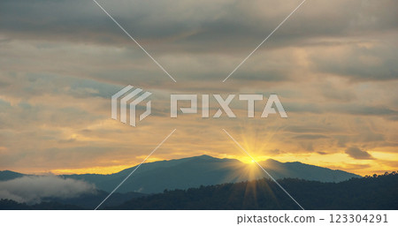 Scenic view dramatic beautiful sunset sky. Natural Sunset Sunrise on meadow silhouette shadow dark land. Vibrant dramatic sky on sunset, dawn, sunrise in Countryside. Landscape Colorful Sky At Sunset Scenic view dramatic beautiful sunset sky. Natural Sunset Sunrise on meadow silhouette shadow dark land. Vibrant dramatic sky on sunset, dawn, sunrise in Countryside. Landscape Colorful Sky At Sunset 123304291