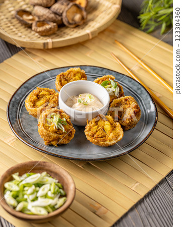 Breaded shiitake mushroom balls 123304360