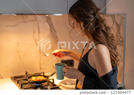 Woman Kitchen Breakfast: Morning Cooking Pancakes Home Woman Kitchen Breakfast: Morning Cooking Pancakes Home 123304477