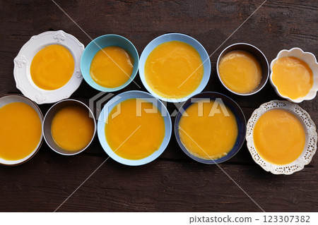 Thanksgiving concept with pumpkin, pumpkin soup .Fall table setting for celebration Autumn holiday with soup Thanksgiving concept with pumpkin, pumpkin soup .Fall table setting for celebration Autumn holiday with soup 123307382
