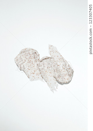 Cosmetic smear. Smears of body scrub. Fruit and berry body scrub texture of swatch Cosmetic smear. Smears of body scrub. Fruit and berry body scrub texture of swatch 123307405