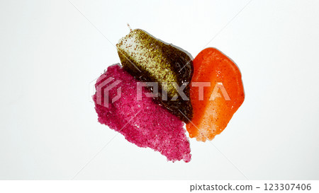 Cosmetic smear. Set smears of body scrub. Fruit and berry body scrub texture of swatch 123307406