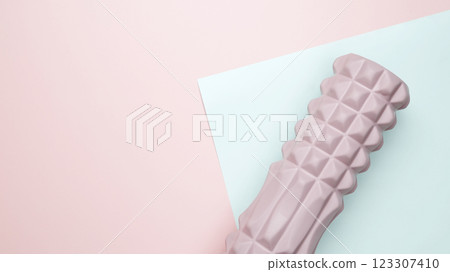 Healthy lifestyle. Fitness accessories foam roller for Myofascial release Healthy lifestyle. Fitness accessories foam roller for Myofascial release 123307410