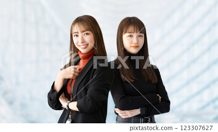 Two women, businesswomen Two women, businesswomen 123307627