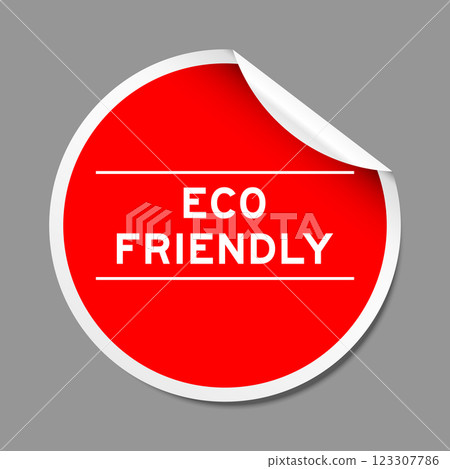 Red color peel sticker label with word eco friendly on gray background 123307786