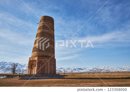 Burana Tower, minaret of the 9th-11th centuries of the Karakhanid state. Touristic place, Kyrgyzstan travel landmark. Ruins of Buranin settlement, ancient city Balasagun 123308000