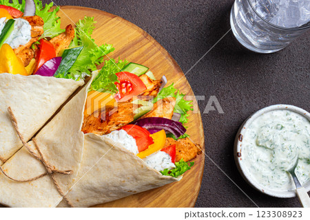 Greek chicken souvlaki or gyros wraps 123308923