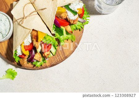 Greek chicken souvlaki wraps Greek chicken souvlaki wraps 123308927