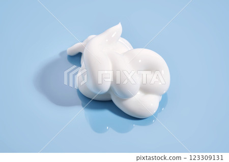 The texture of white cream on a blue background. 123309131