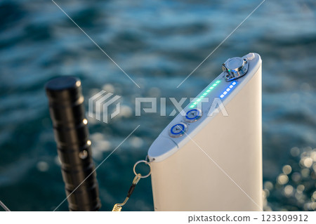 Close-up of the engine on a sports yacht in the Kotor Bay, Montenegro, highlighting advanced maritime technology and performance. Close-up of the engine on a sports yacht in the Kotor Bay, Montenegro, highlighting advanced maritime technology and performance. 123309912