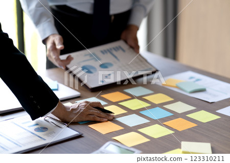 they have collected and transcribing it onto sticky color notes 123310211