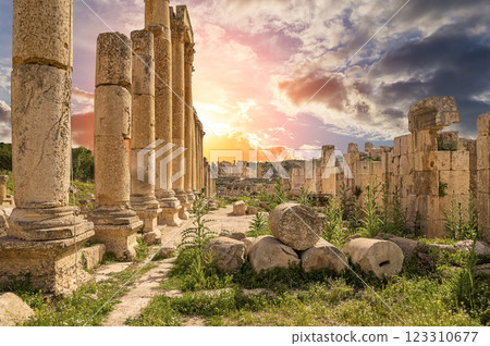 Roman ruins (against the background of a beautiful sky with clouds) in the Jordanian city of Jerash (Gerasa of Antiquity), capital and largest city of Jerash Governorate, Jordan Roman ruins (against the background of a beautiful sky with clouds) in the Jordanian city of Jerash (Gerasa of Antiquity), capital and largest city of Jerash Governorate, Jordan 123310677