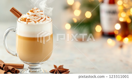 Glass with a handle on a stem with a lamina of white airy foam sprinkled with spices on top. Glass with a handle on a stem with a lamina of white airy foam sprinkled with spices on top. 123311001