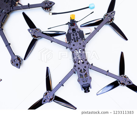 FPV drone in production on white background. 123311383