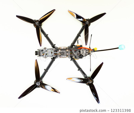 FPV drone in production on white background. 123311398