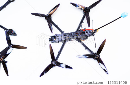 FPV drone in production on white background. 123311406