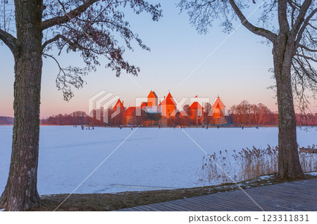 Trakai castle at winter, beautiful medieval castle in the evening light. Lithuania Trakai castle at winter, beautiful medieval castle in the evening light. Lithuania 123311831
