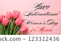 Stylish banner, greeting card with the inscription Happy Women's Day with a bouquet of pink tulips on a pink background. 123312436