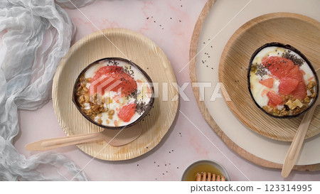 Yogurt with grapefruit, granola, chia and honey Yogurt with grapefruit, granola, chia and honey 123314995