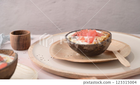 Yogurt with grapefruit, granola, chia and honey Yogurt with grapefruit, granola, chia and honey 123315004