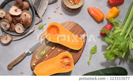 Autumn vegetables arranged on a kitchen worktop 123315077